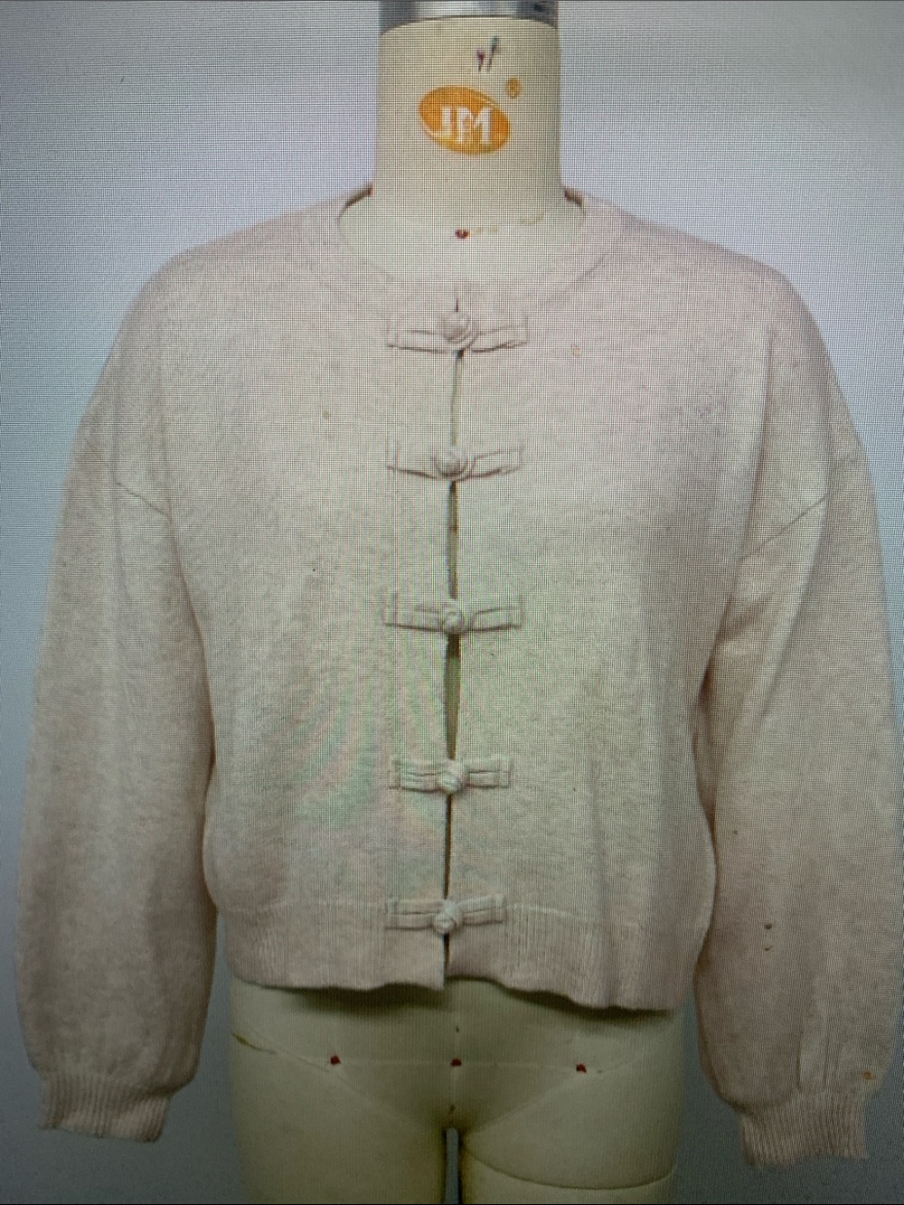 Classic Cream Knit Sweater with Decorative Knot Closures - Picture 2 of 5